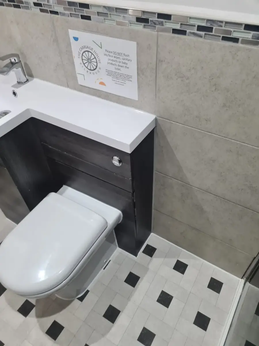 Basin, vanity and toilet after the bathroom repair