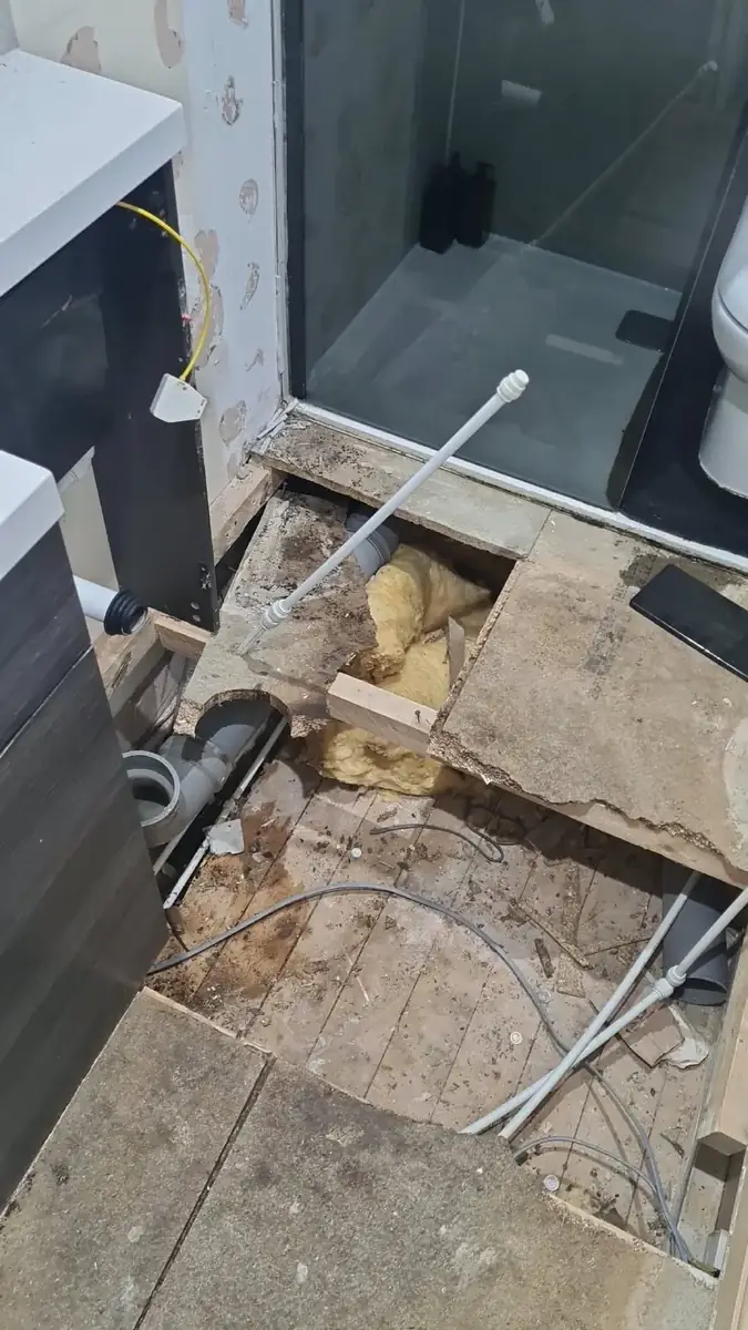 Repair work around the shower and waste pipe