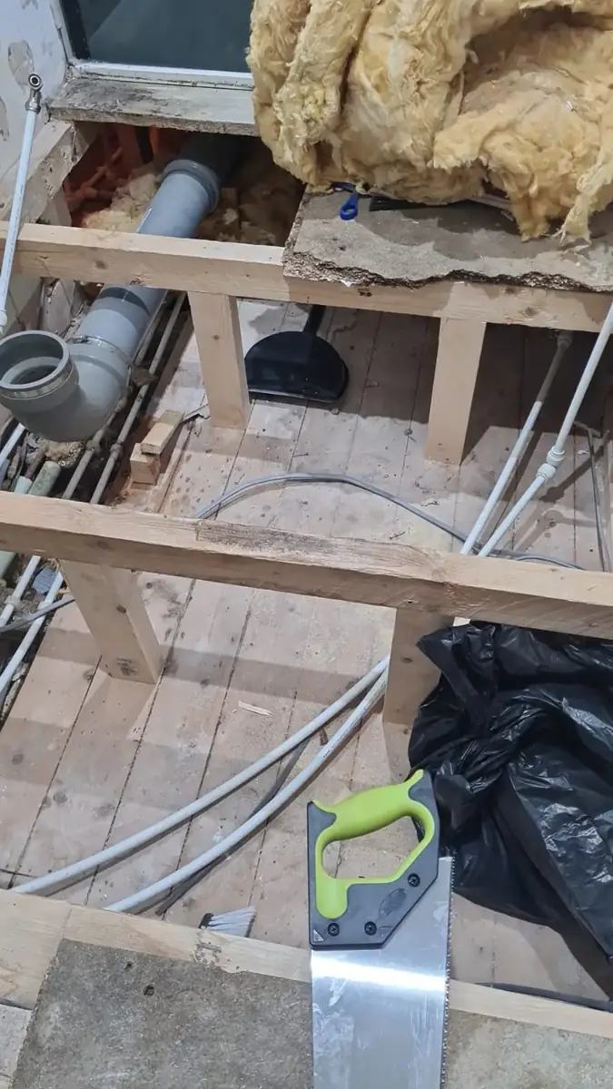 Pipework beneath the bathroom floor