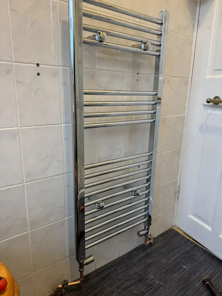 Fitted chrome heated towel rail