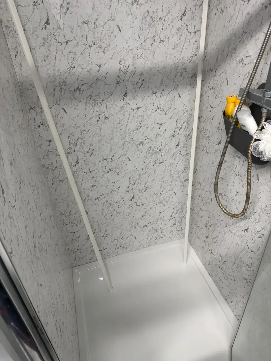 Finished shower tray and sealed edges