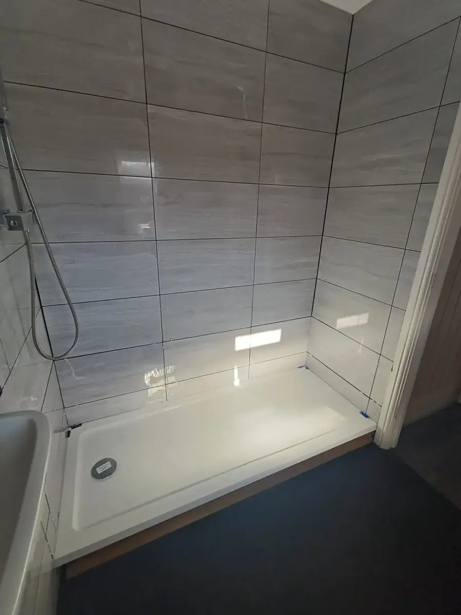Completed shower enclosure and tray