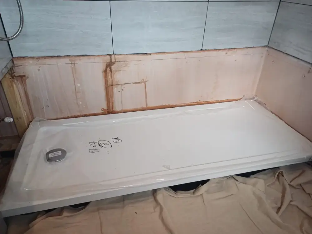 Shower tray before the wall finish was completed