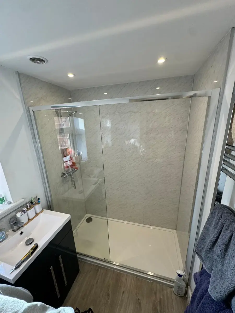 Fitted sliding shower screen
