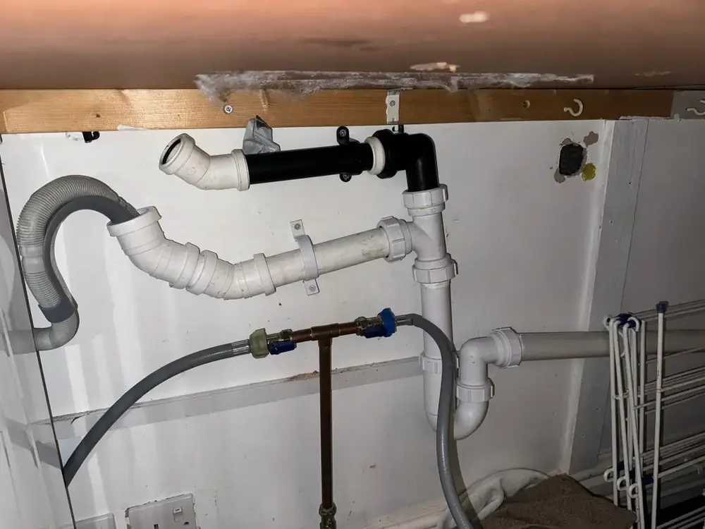 Washing machine and dishwasher supply and waste pipework